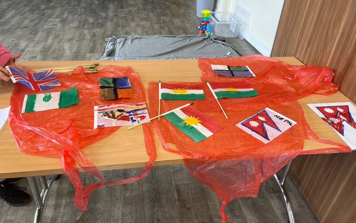 Flags representing different countries and cultures, painted by REMA community members